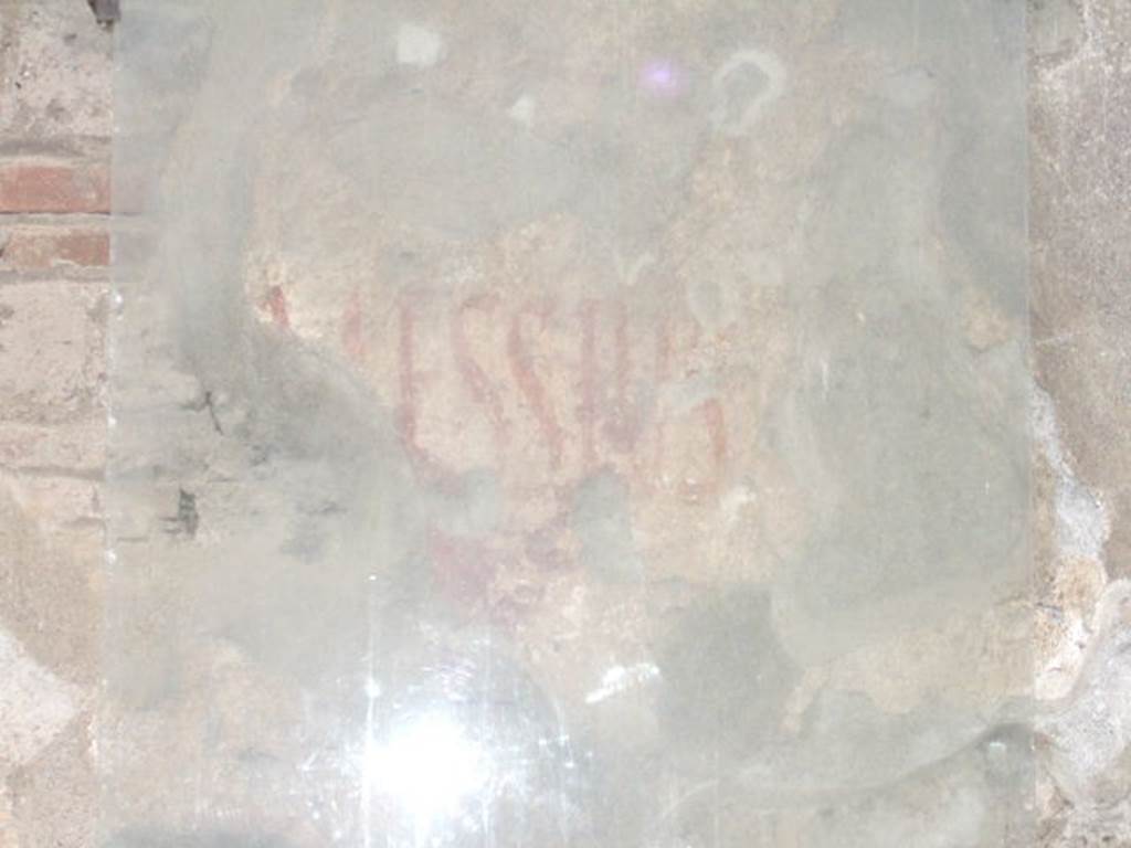 II.3.8 Pompeii. December 2006. Graffiti on wall between II.3.8 and II.3.9.