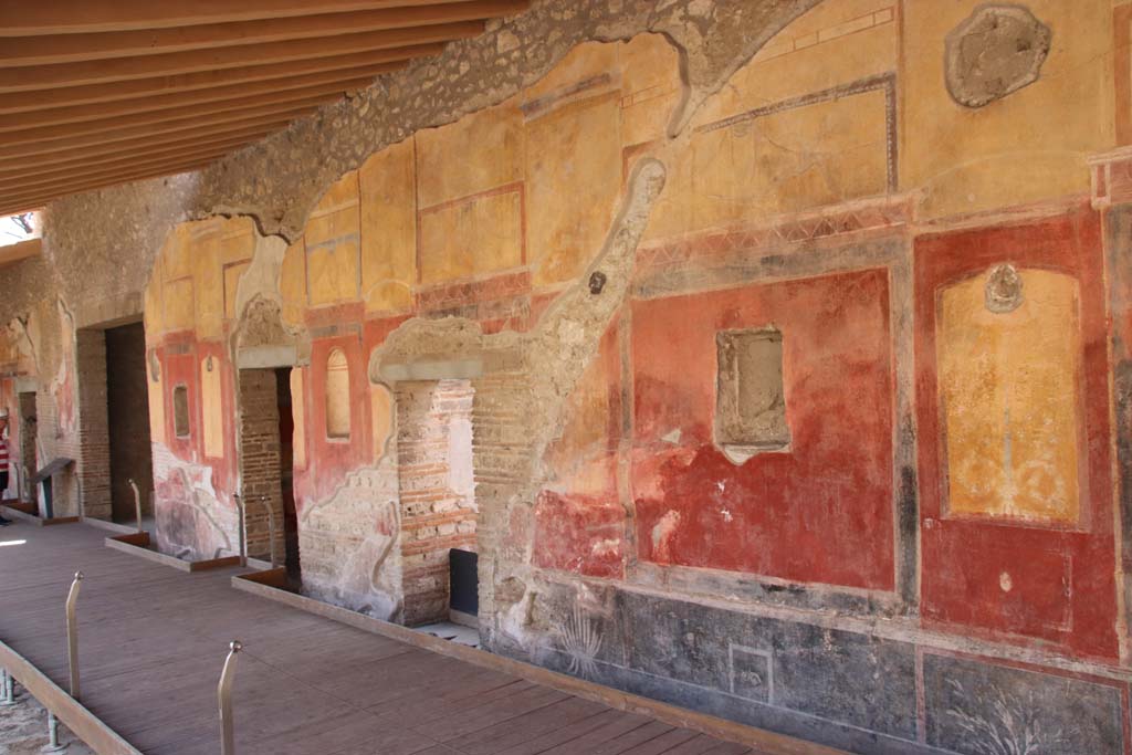 II.4.6 Pompeii. September 2019. Looking towards west wall of portico, with large doorway to summer triclinium, on the left.
Photo courtesy of Klaus Heese.