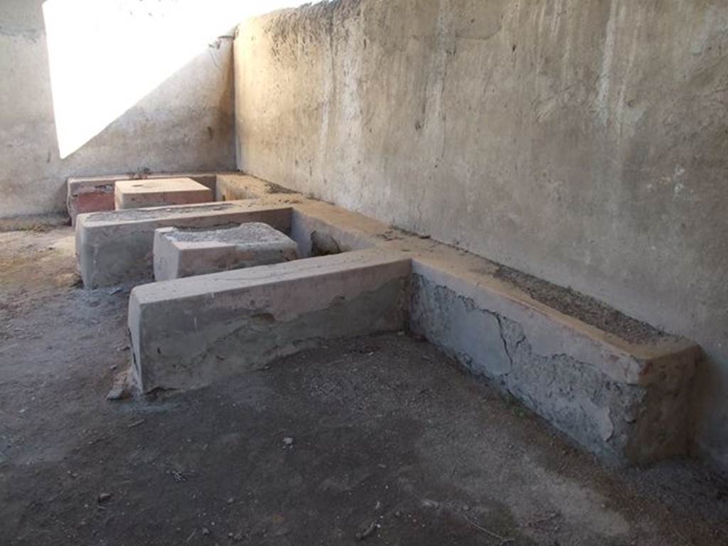 II.4.7 Pompeii. December 2006. Stone seats and tables in compartments.