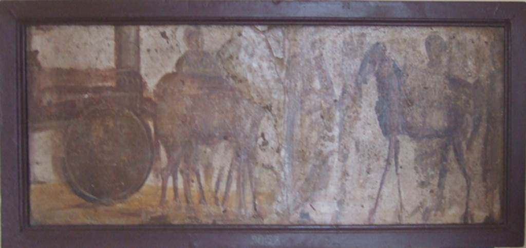 II.4.3 Pompeii. Part of the “Forum Frieze” found in the atrium.
On the left part is the arrival from the countryside of a cart pulled by a mule and an ass carrying a load.
On the right part is three men with another donkey with a saddle.
Now in Naples Archaeological Museum. Inventory number 9057.
See Accademici Ercolanesi, 1762. Le Pitture Antiche d’Ercolano: Tome III. (p.227, Tav. 43).