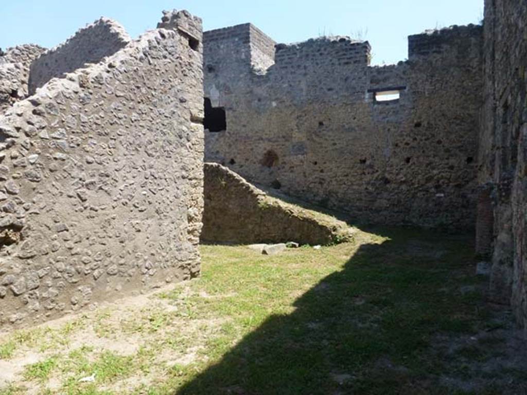 II.4.4 Pompeii. June 2012. Looking towards south wall with ramp. Photo courtesy of Michael Binns.