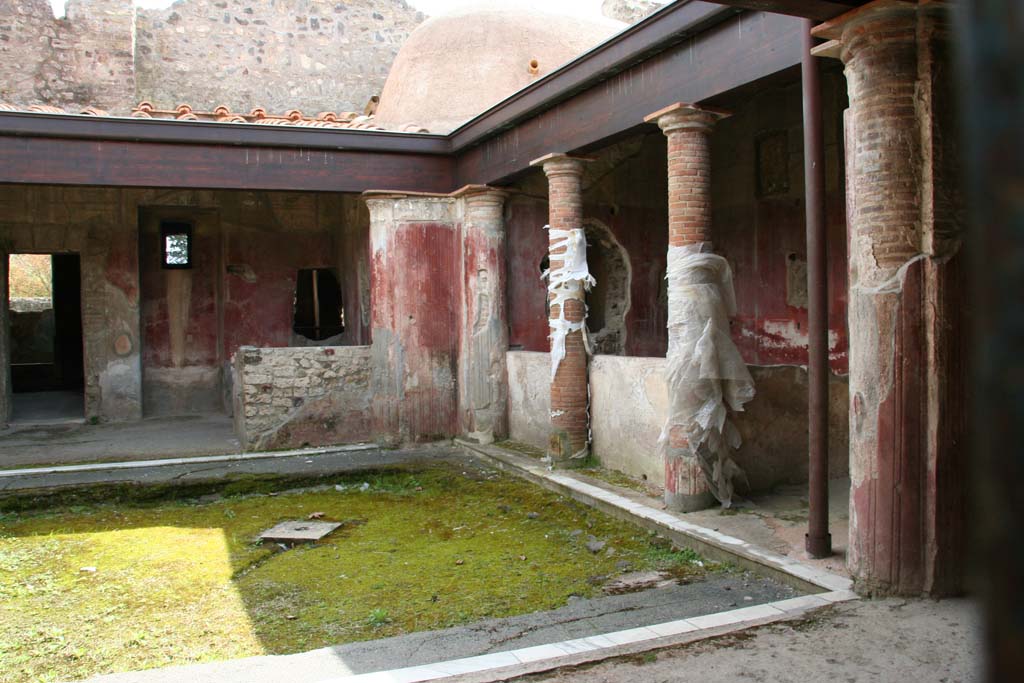 II.4.6 Pompeii. April 2013. Looking towards south-west corner and west side of portico. Photo courtesy of Klaus Heese.