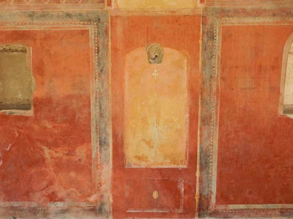 II.4.6 Pompeii. May 2016. Painted west wall of portico. Photo courtesy of Buzz Ferebee.