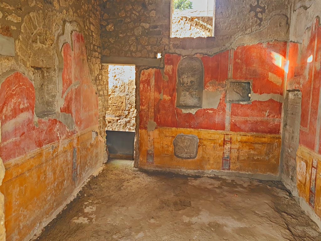II.4.6 Pompeii. March 2024.
Looking towards south-west corner, and doorway to rear corridor, in room at south end of west portico. Photo courtesy of Giuseppe Ciaramella.