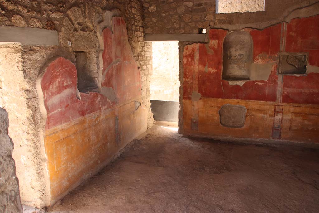 II.4.6 Pompeii. September 2019.
Looking towards south wall, and doorway to rear corridor in south-west corner, in room at south end of west portico.
Photo courtesy of Klaus Heese.