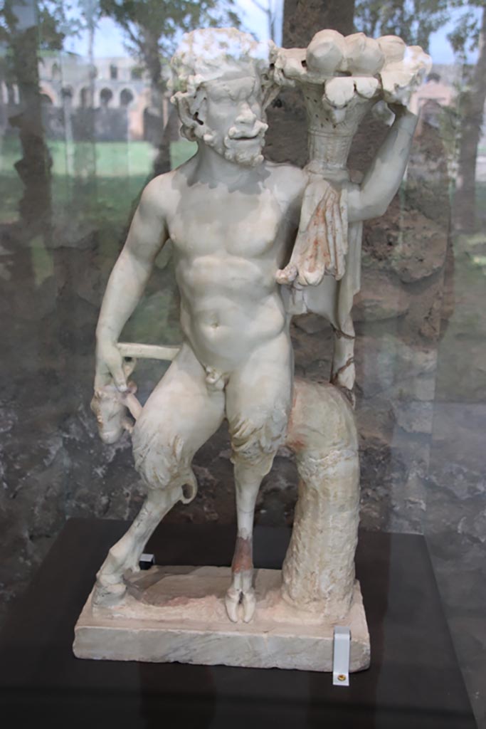 II.4.2/6 Pompeii. October 2022.
Statuette of marble Pan with the head of an animal, found in garden area. Photo courtesy of Klaus Heese