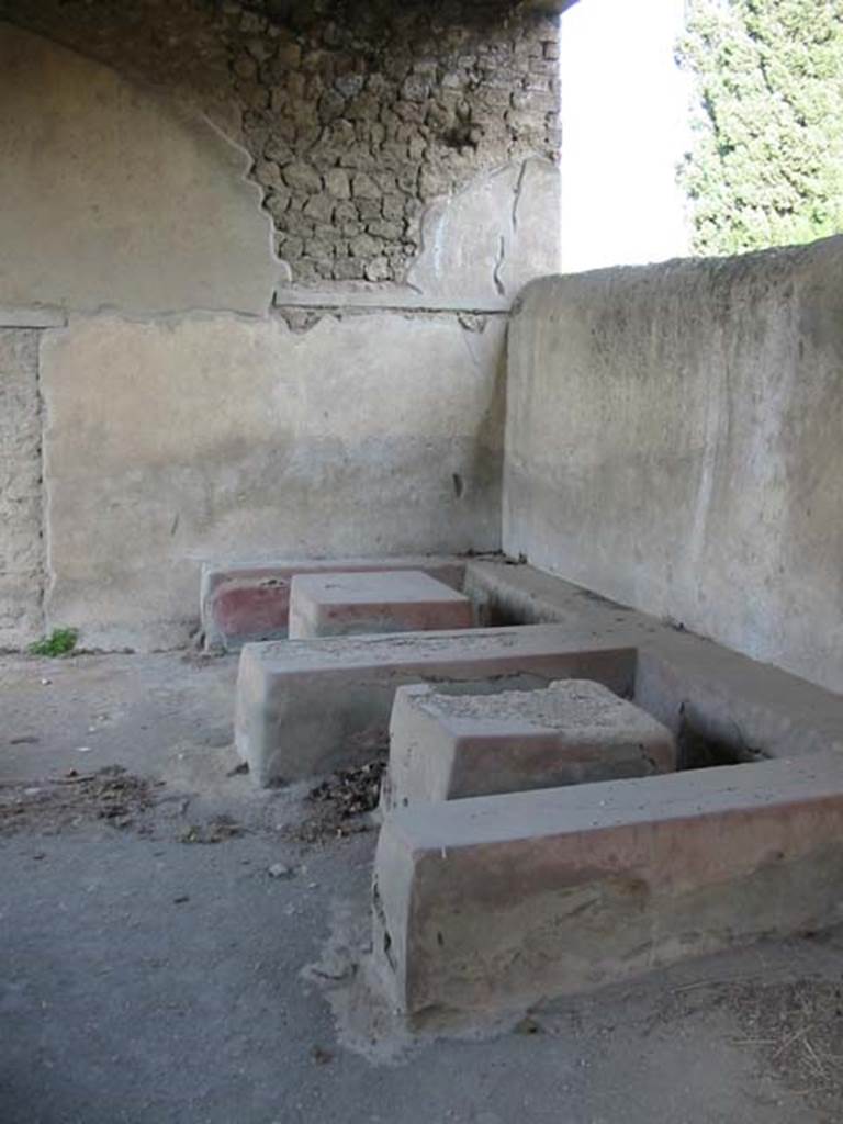 II.4.7 Pompeii. May 2003. Stone seats and tables in compartments. Photo courtesy of Nicolas Monteix.