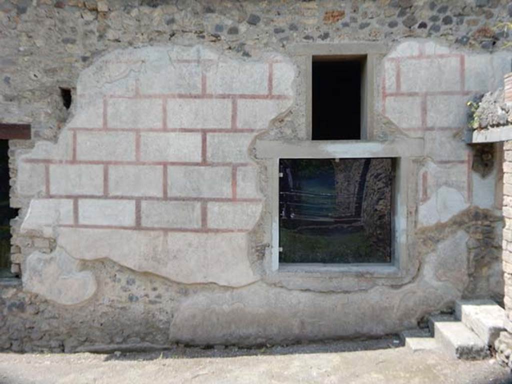 II.4.10 Pompeii. May 2016. Looking west towards exterior façade with window intobiclinium. Photo courtesy of Buzz Ferebee.