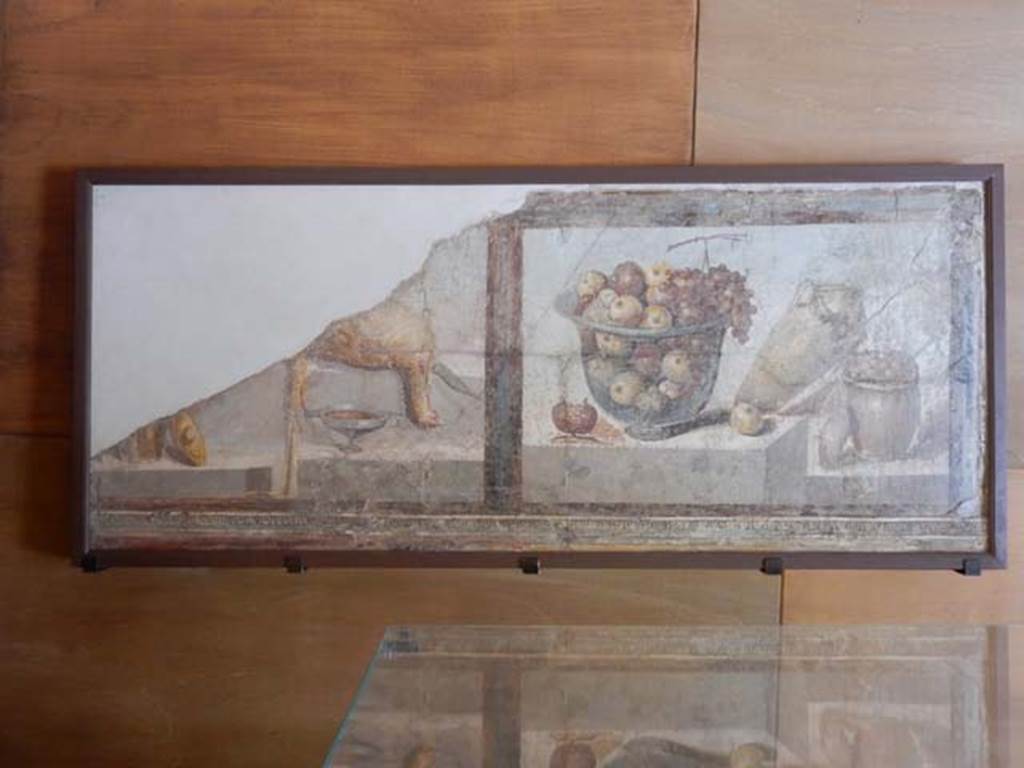 II.4.10 Pompeii. May 2016. Wall painting of two still-life panels including a dead game bird and a glass bowl filled with fruit. Found 6th July 1755. Now in Naples Archaeological Museum. Inventory number 8611. Photo courtesy of Buzz Ferebee.
