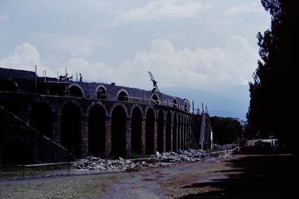 II.6 Pompeii. 1968. Looking south-east towards west side of ampitheatre. Photo by Stanley A. Jashemski.
Source: The Wilhelmina and Stanley A. Jashemski archive in the University of Maryland Library, Special Collections (See collection page) and made available under the Creative Commons Attribution-Non Commercial License v.4. See Licence and use details.
J68f2002