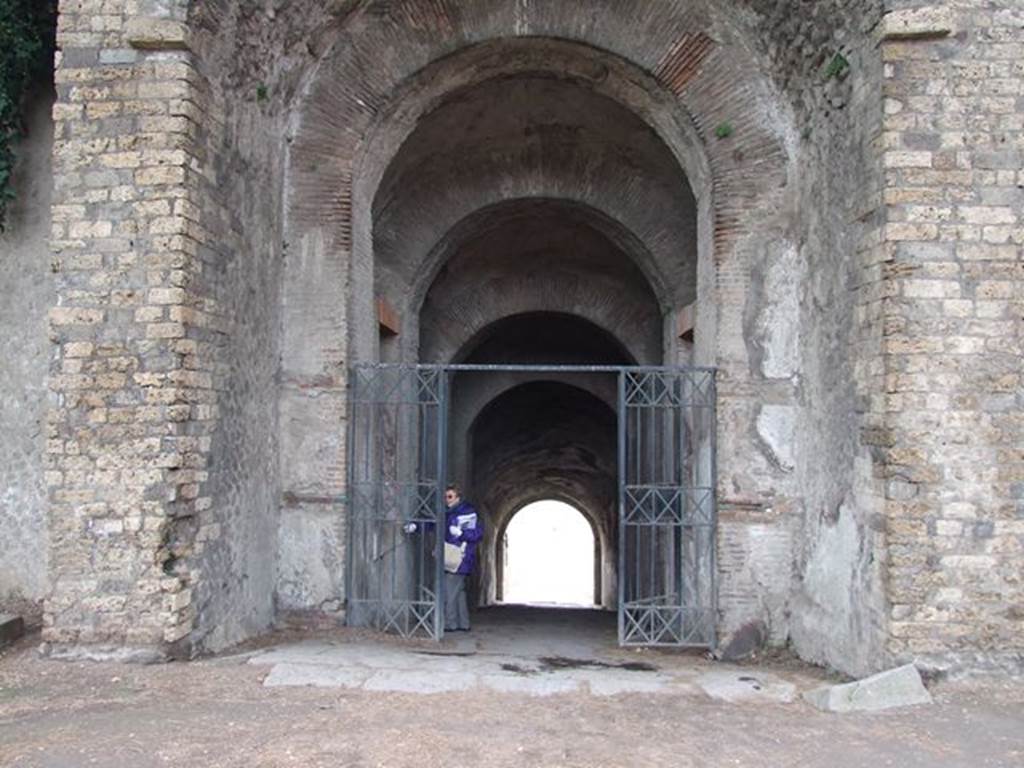 II.6 Pompeii. December 2006. Amphitheatre, northern entrance.
According to Pagano and Prisciandaro, on 29th December 1814 (PAH III, 1) 3 skeletons were found near the doorway that lead to the arena.
Near to them were two gold armbands with head of a serpent, a bracelet, a ring with head of serpent, and a piece of chain used as a bootlace (un pezzo di cateniglia ad uso di laccettino). See Pagano, M. and Prisciandaro, R., 2006. Studio sulle provenienze degli oggetti rinvenuti negli scavi borbonici del regno di Napoli. Naples : Nicola Longobardi.
(p.110)