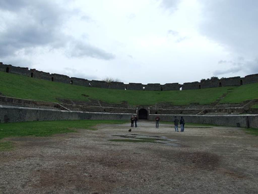 II.6 Pompeii. December 2006. Arena and seating of Amphitheatre, looking south.