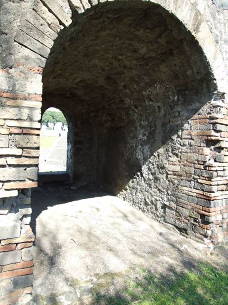 II.6 Pompeii. March 2009. Arched passageway leading through to upper seating of the Amphitheatre.