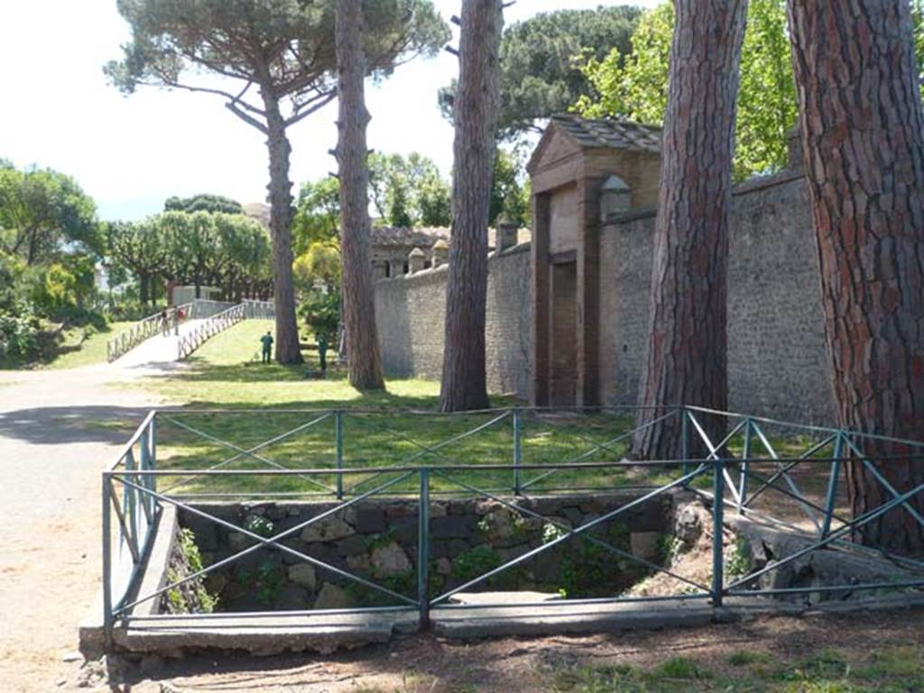 II.7.3 Pompeii. Palaestra. May 2012. Looking south along wall from near II.7.3, with entrance to II.7.2, centre right. Photo courtesy of Buzz Ferebee.