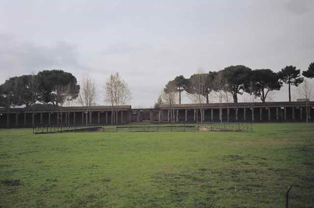 II.7.3 Pompeii. Palaestra. May 2010. View of west side and Piscina or swimming pool, from entrance doorway.
Photo courtesy of Rick Bauer.
According to NdS 1939; A group of 17 victims were found in an area of about 20 sq metres on the west side of the pool.
Among the more or less isolated people lying there a group of four victims could be identified with the skeleton of a child close to that of another person.
It was not possible to take casts of any of the victims due to the nature of the ash bank not having left any voids.
See Notizie degli Scavi di Antichità, 1939, p. 215.