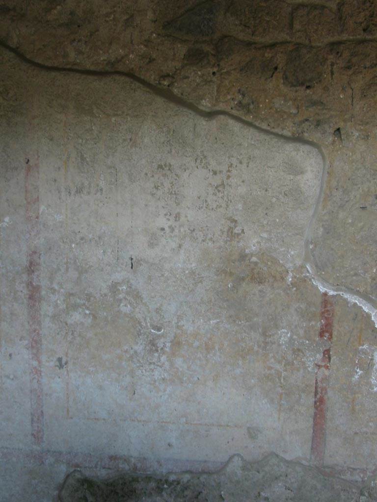 II.8.3 Pompeii. May 2003.
East wall with remains of painted decoration. Photo courtesy of Nicolas Monteix.