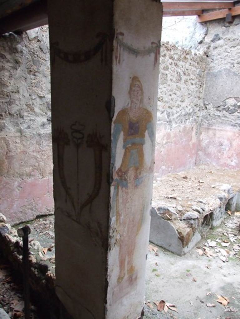 II.9.1. December 2007. Painting of Horn of Plenty and Priapus on column on the north side of the triclinium.