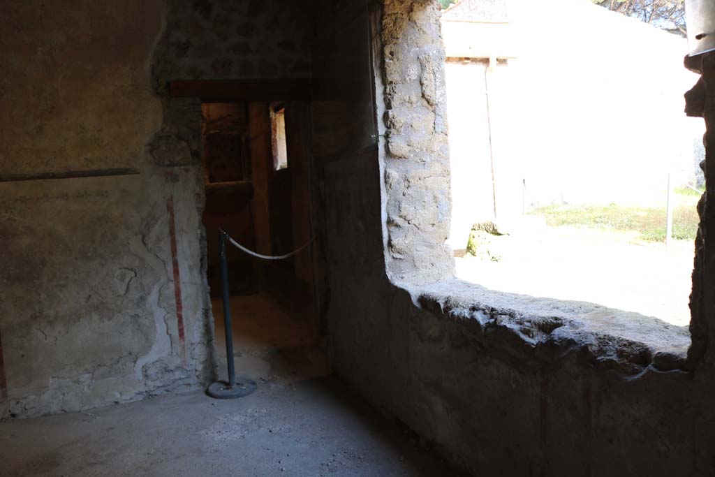 II.9.4 Pompeii. December 2018.
Room 5, north-east corner with doorway to room 6, cubiculum with floral lararium. Photo courtesy of Aude Durand.