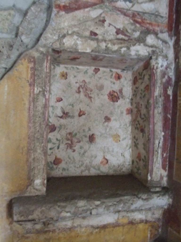 II.9.4 Pompeii. December 2007. Room 6, floral lararium at east end of north wall.