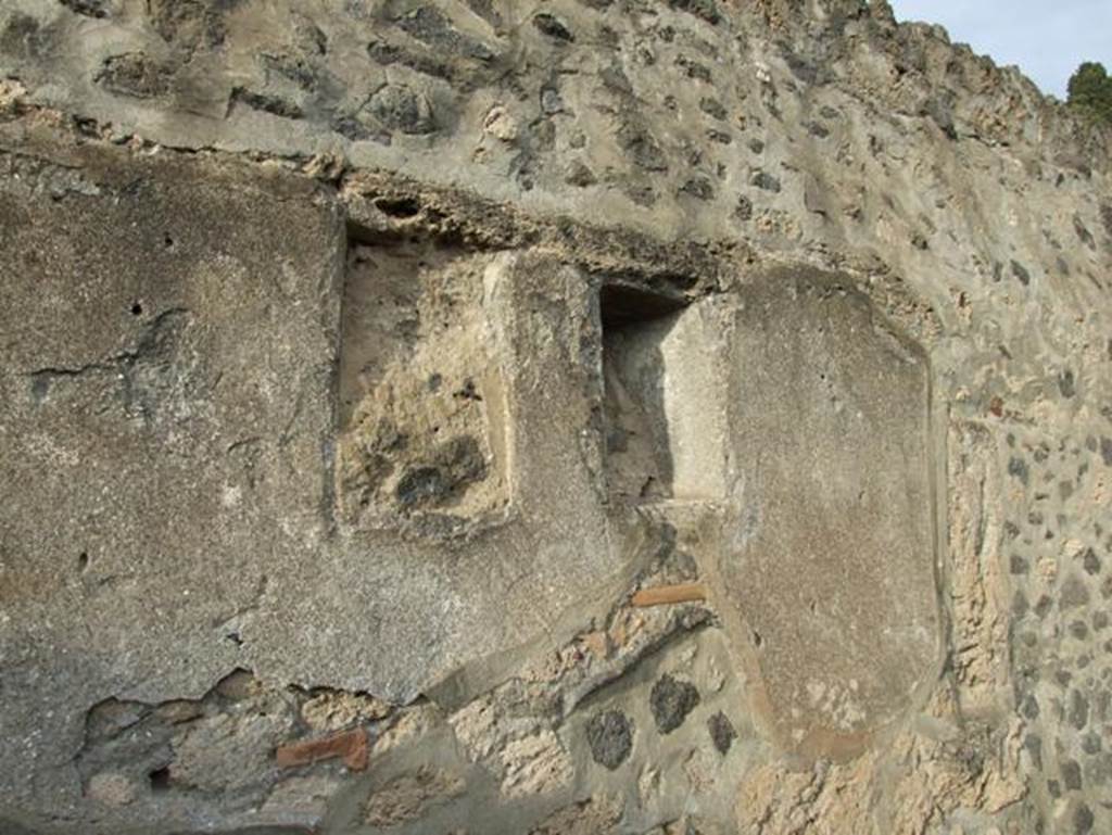 II.9.7. Garden entrance to House of Summer Triclinium. December 2007. Niches on north wall.