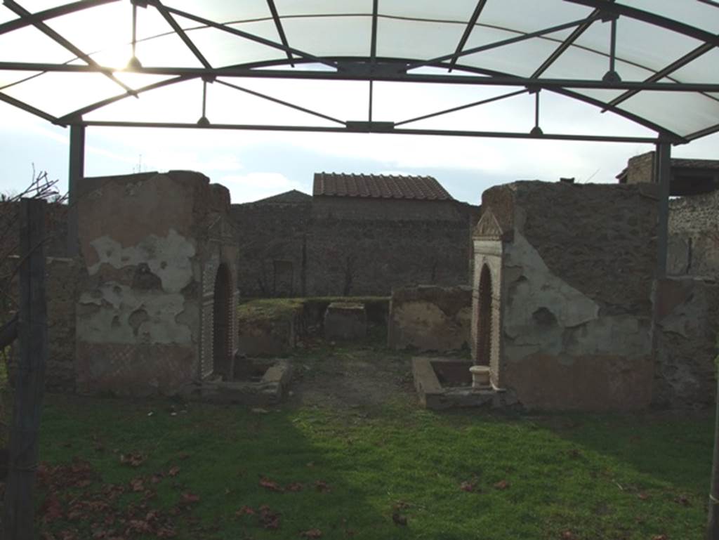 II.9.7. Garden entrance to House of Summer Triclinium. December 2007. Looking west at the two fountains and a triclinium.