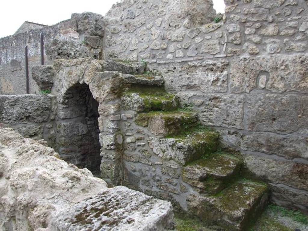 III.2.1 Pompeii. March 2009. Room 3. Steps to upper floor, with cupboard underneath.