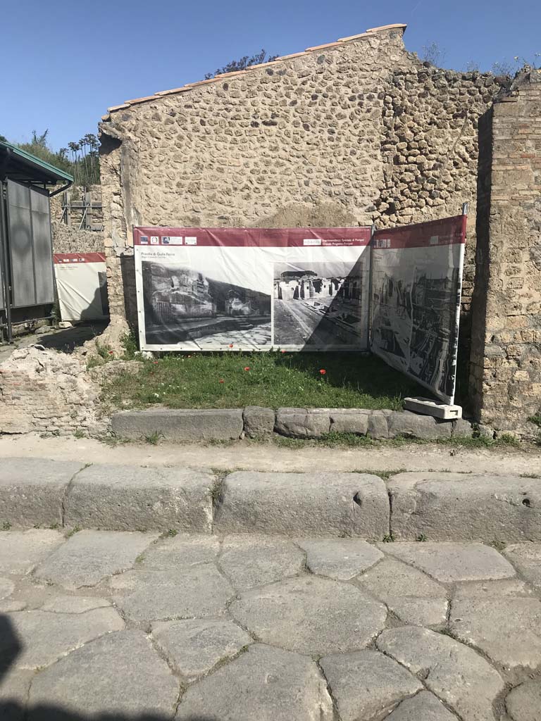 III.4.1 Pompeii, on right. Vicolo di Ifigenia, on left. April 2019. Looking north towards entrance threshold.
The west wall, on left, has not been restored. Photo courtesy of Rick Bauer.