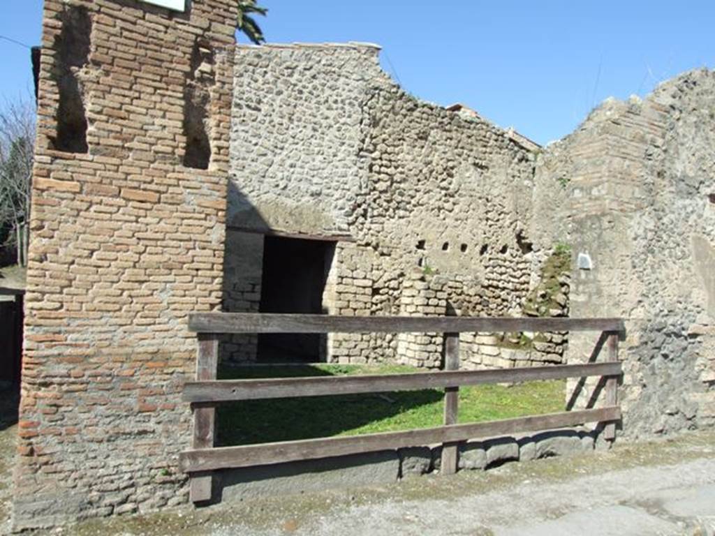 III.4.1 Pompeii. March 2009. Looking north-east across entrance doorway.