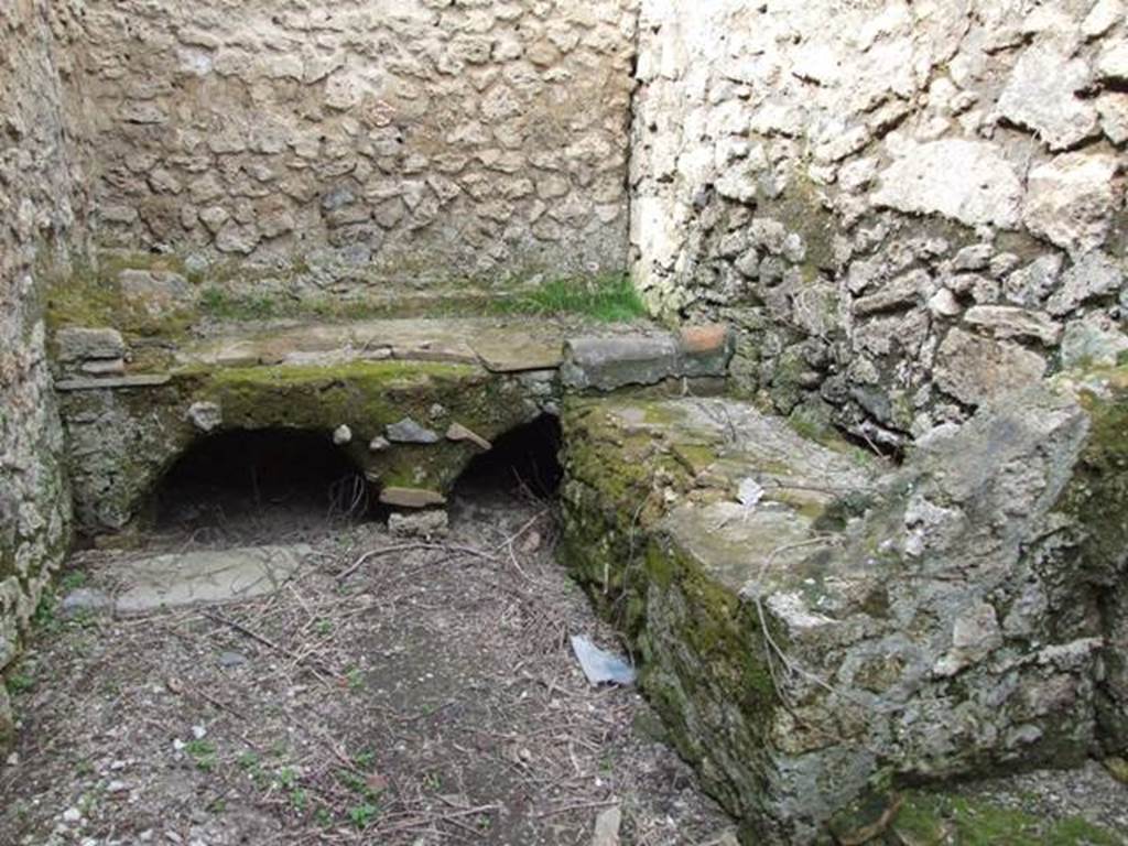 III.4.3 Pompeii. March 2009. Room 6. Kitchen and Latrine. Hearth and bench.