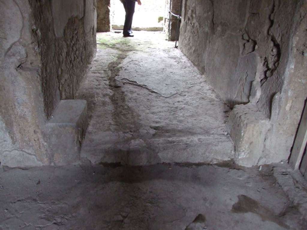 III.4.3 Pompeii. March 2009. Looking north at doorway and floor of Room 7 from room 8