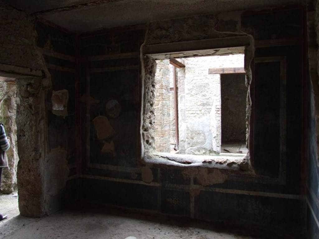 III.4.3 Pompeii. March 2009. Room 13. West wall, with window overlooking garden Room 14.
