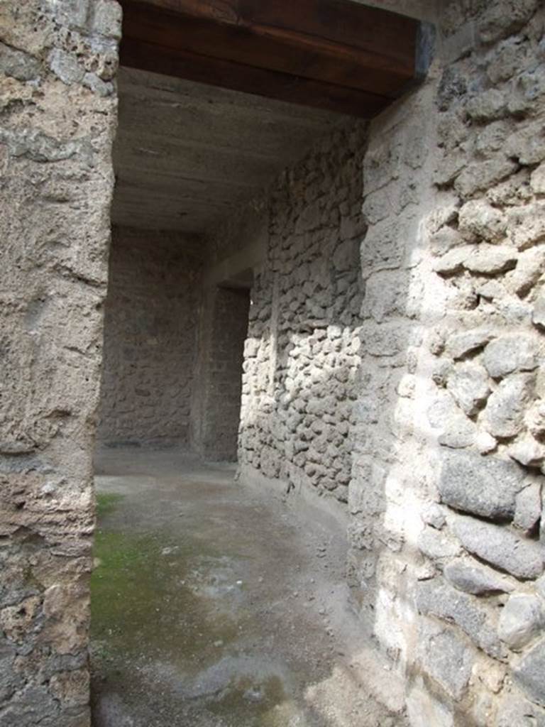 III.4.3 Pompeii. March 2009. Room 23. Looking north through doorway to east side of courtyard at room 12.