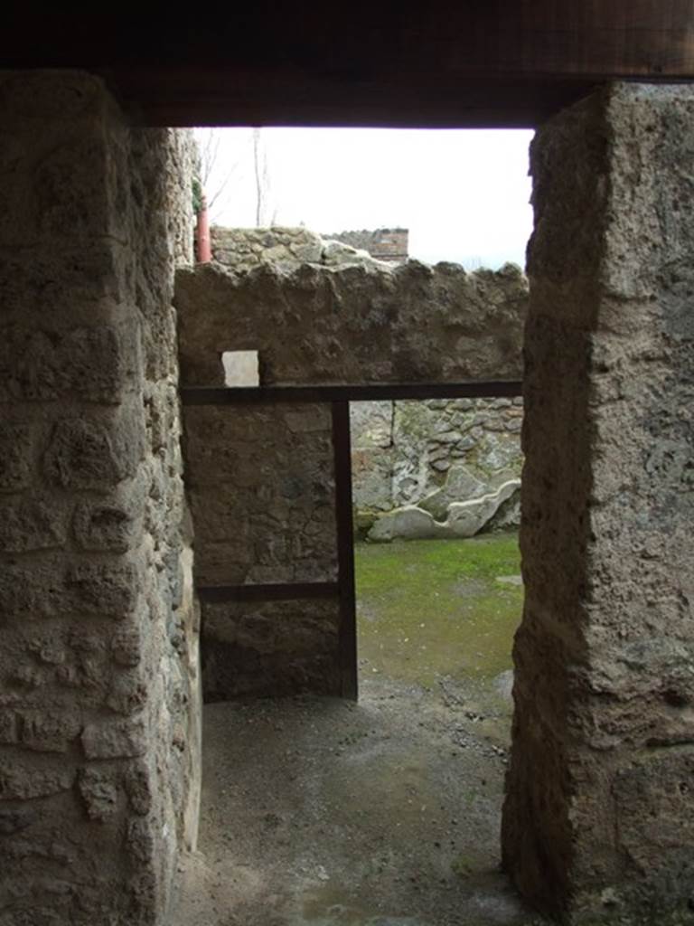 III.4.3 Pompeii. March 2009. Room 12. Courtyard. Looking south to doorway to room 23.