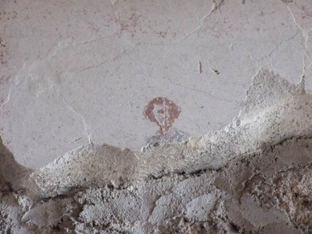 III.4.b. Pompeii. March 2009. Room 4. Exedra. Detail from east wall above door