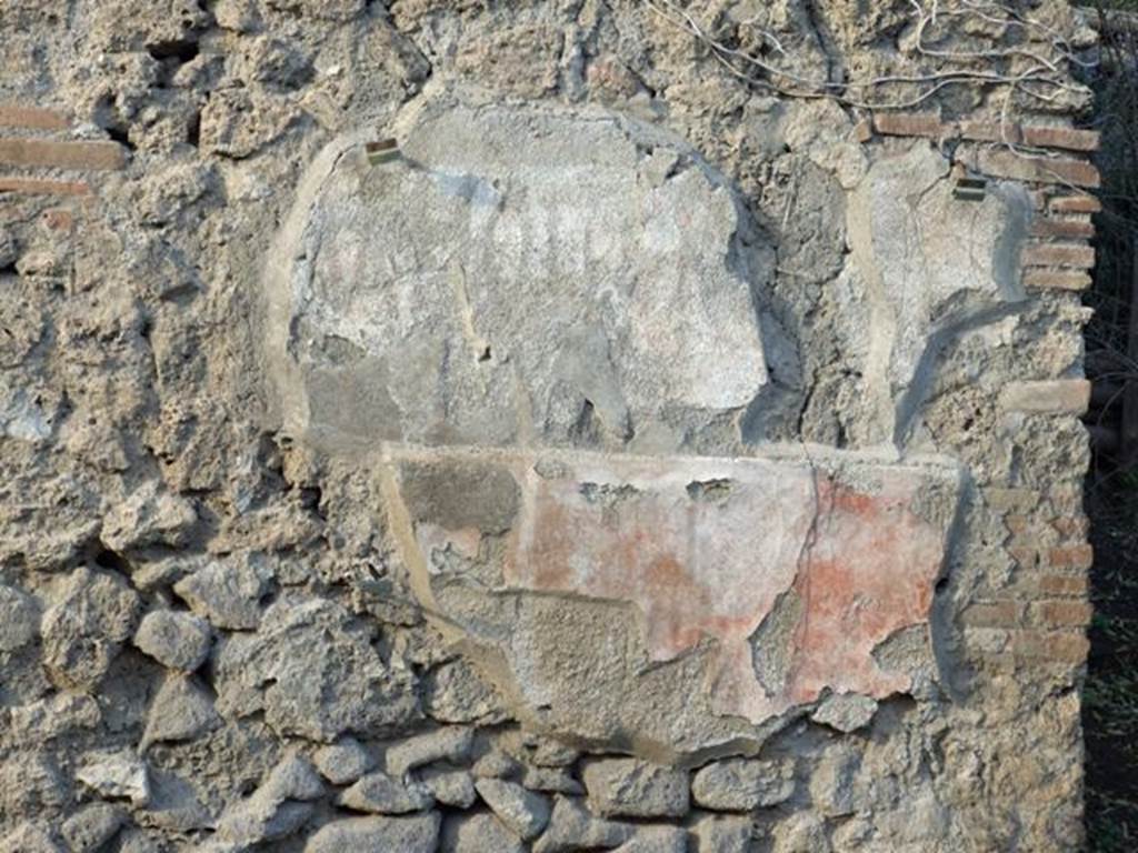 III.6.5 Shop. Painted plaster.