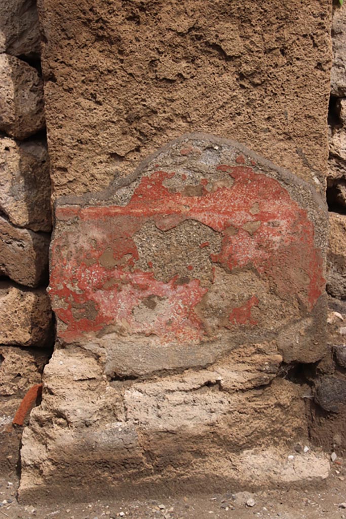 III.6.5 Pompeii. May 2024.
Detail from lower pilaster on east side of doorway. Photo courtesy of Klaus Heese.