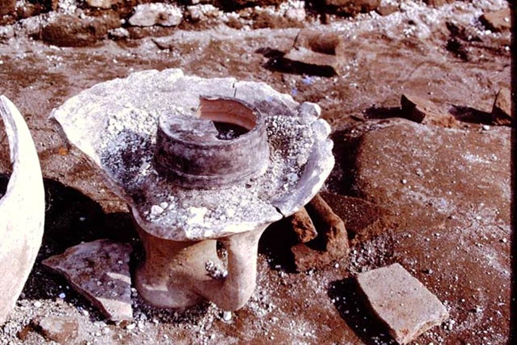III.7 Pompeii. 1976. Top part of large amphora, used as a brazier, and now free of the lapilli. Photo by Stanley A. Jashemski.
Source: The Wilhelmina and Stanley A. Jashemski archive in the University of Maryland Library, Special Collections (See collection page) and made available under the Creative Commons Attribution-Non Commercial License v.4. See Licence and use details. J76f0448