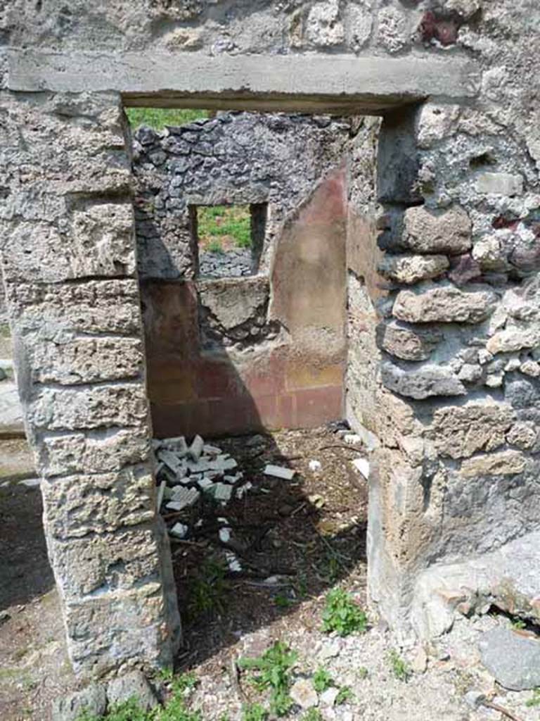 III.8.4 Pompeii. May 2010. Doorway to small room on east side of entrance corridor.