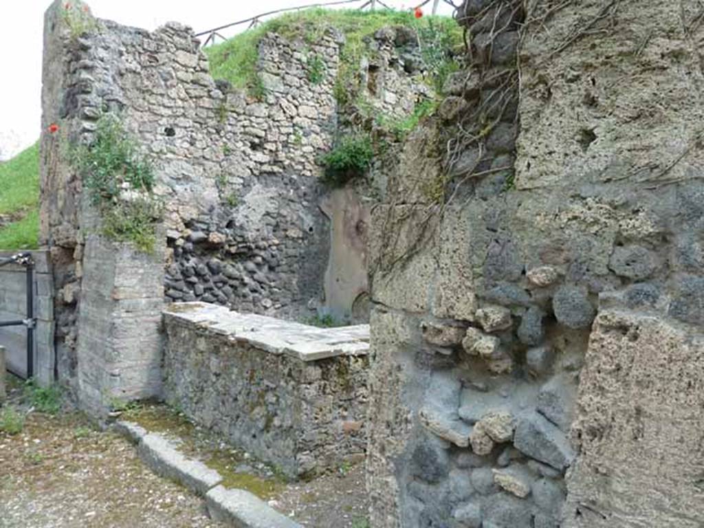 III.8.8 Pompeii. May 2010. Entrance to bar on Via di Nola, looking east.