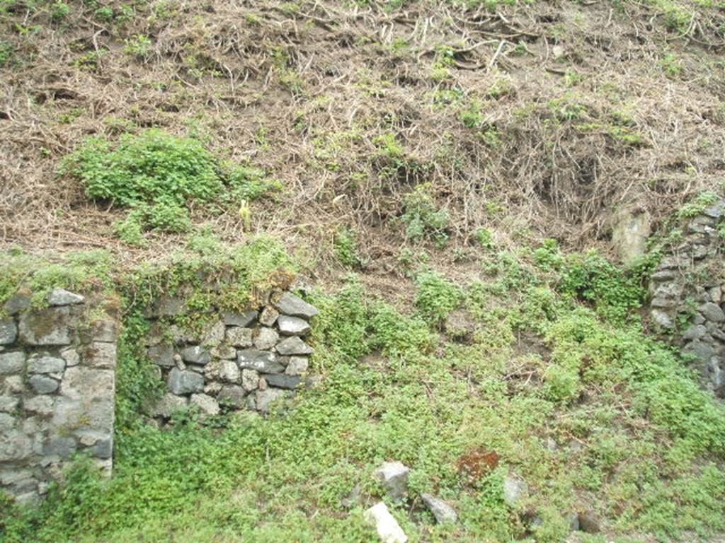 III.9.3 Pompeii. May 2005. Collapsed bank of earth.