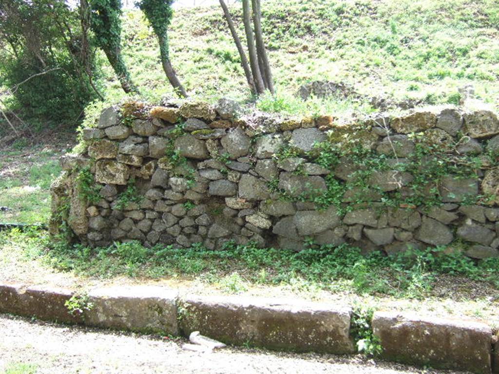 III.10.3 Pompeii. May 2006. Wall on east side of entrance, originally with a window. III.10.4 can be seen on the left.