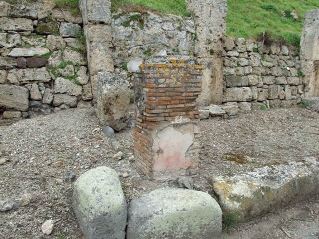 IV.2.a Pompeii. March 2009. Pilaster with the remains of painted plaster.