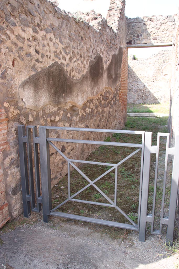 V.1.3 Pompeii. October 2023.
Looking north along west wall of entrance corridor/fauces. Photo courtesy of Klaus Heese.