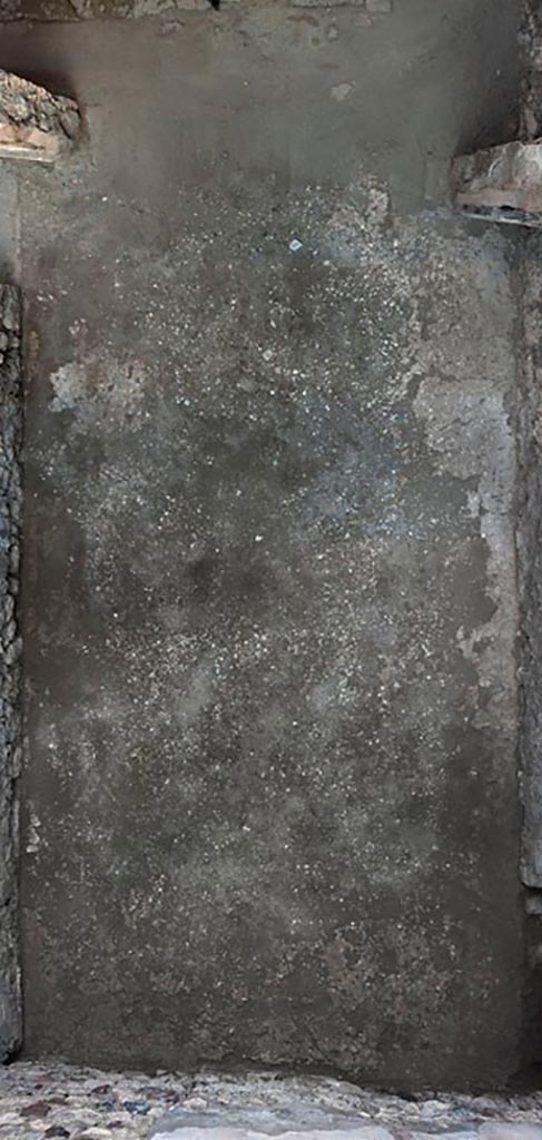 V.1.3 Pompeii. c.2008-10.
Room 4, triclinium, flooring. Photo by Hans Thorwid.
“The floor was made in cocciopesto and is badly damaged.
It is preserved only in patches and is best preserved along the western wall and in the SW and SE corners.
There is no cocciopesto floor in the niche. The floor abuts to the wall in the west.
In the door opening between room 4 and the atrium there is a lava threshold.
The western part is slightly higher than the eastern which shows that the doors opened inwards towards the triclinium.”
Photo and words courtesy of the Swedish Pompeii Project.
