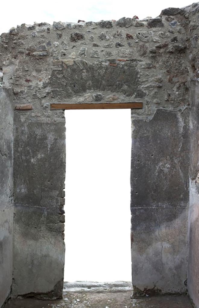 V.1.3 Pompeii. c.2012.
Room 6, east wall with doorway to atrium, room 2.
Photo by Hans Thorwid.
“E wall in 2012. Restored parts of the wall photographed and merge with the lower part and floor line of earlier photos from 2005-7.”
Photo and words courtesy of the Swedish Pompeii Project.