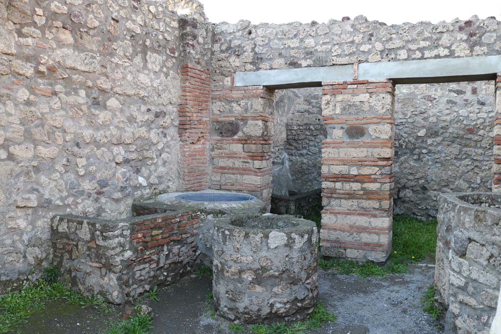 V.1.4 Pompeii. December 2018. Looking towards west side of workshop. Photo courtesy of Aude Durand.