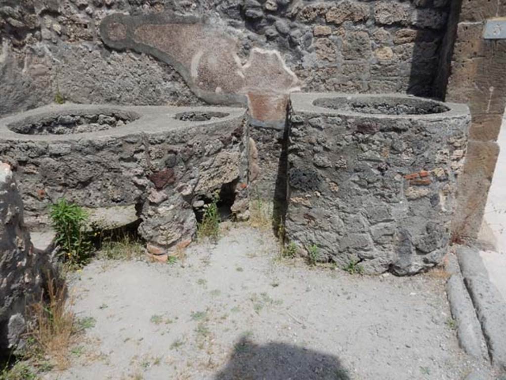V.1.5 Pompeii. May 2017. Looking towards east wall, with boilers, kettles or vats.
Photo courtesy of Buzz Ferebee.