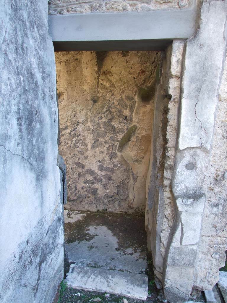 V.1.7 Pompeii. December 2007. Room 13, doorway to small room/cupboard, looking south.