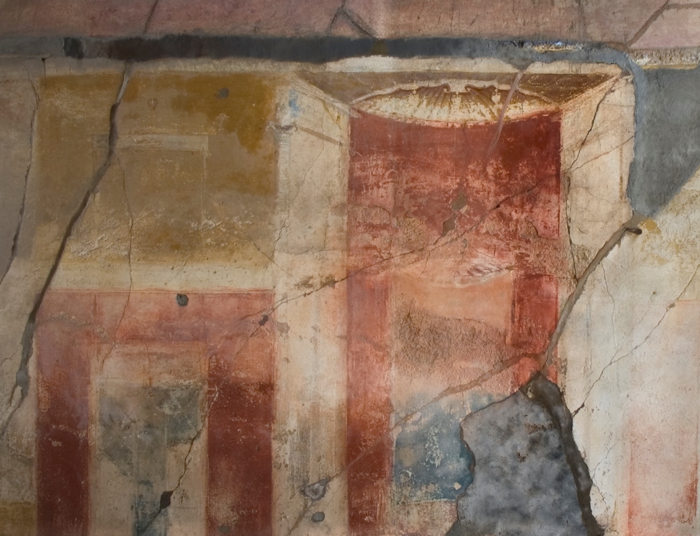 V.1.7 Pompeii. c.2005-7. Room 7, detail of painted decoration in centre of south wall. Photo by Thomas Staub.
Photo courtesy of the Swedish Pompeii Project.