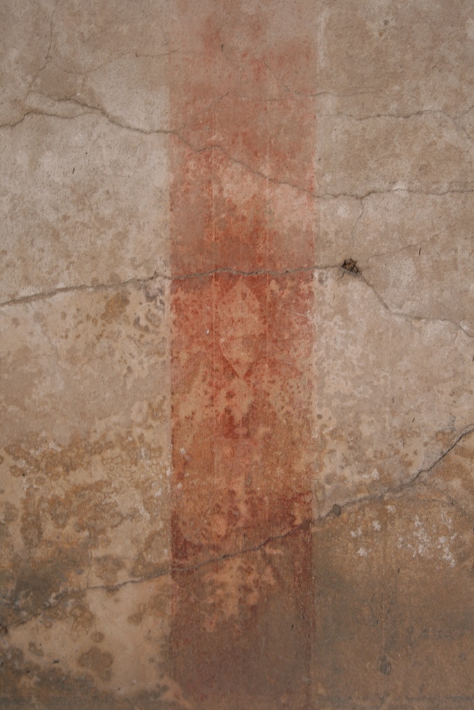 V.1.7 Pompeii. c.2005-7.
Room 8, detail of painted decoration on east wall. Photo by Thomas Staub.
Photo courtesy of the Swedish Pompeii Project.